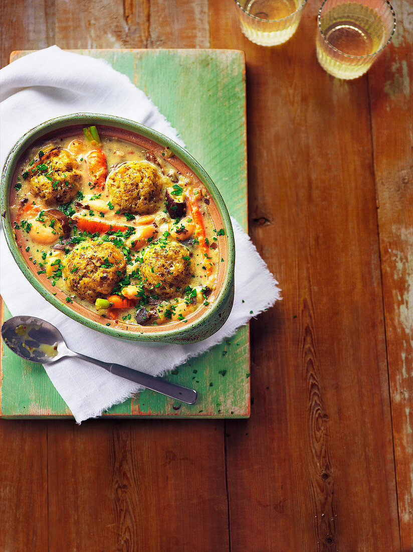 Spring vegetable stew with cheddar dumplings