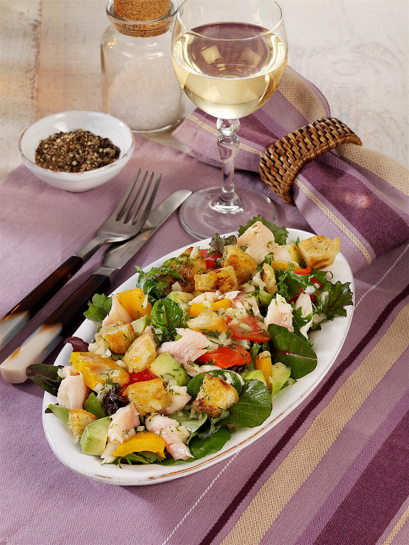 Avocado and smoked trout salad with peppers