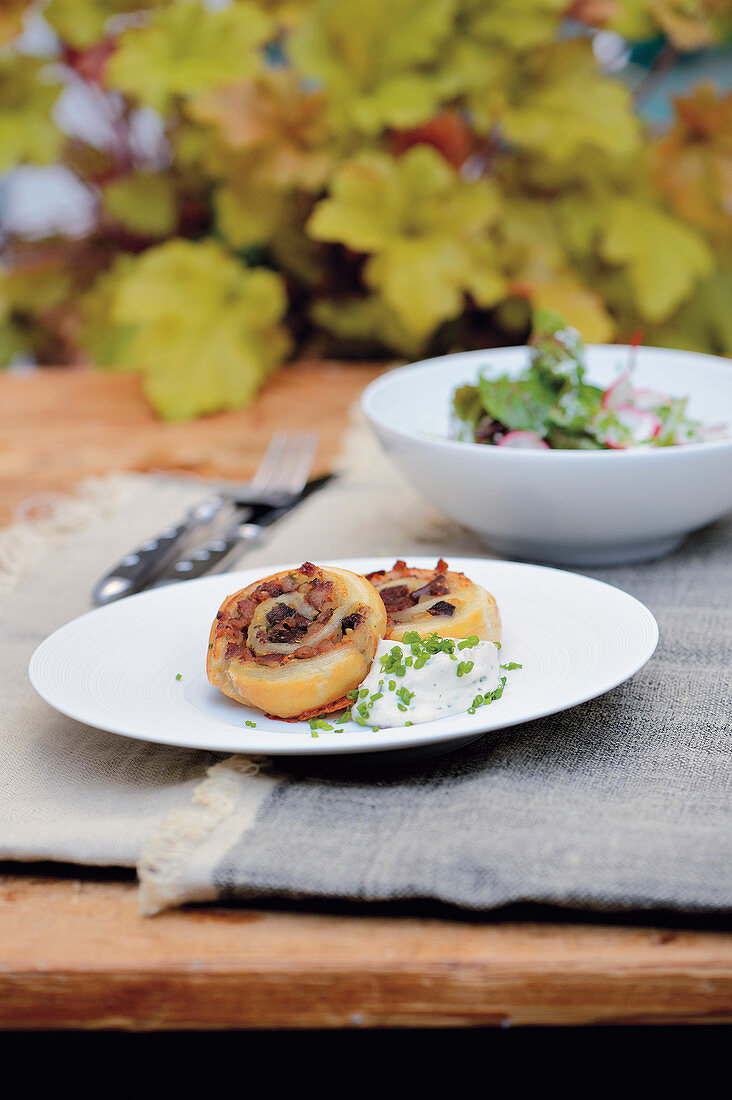 Puff pastry snail with wild boar