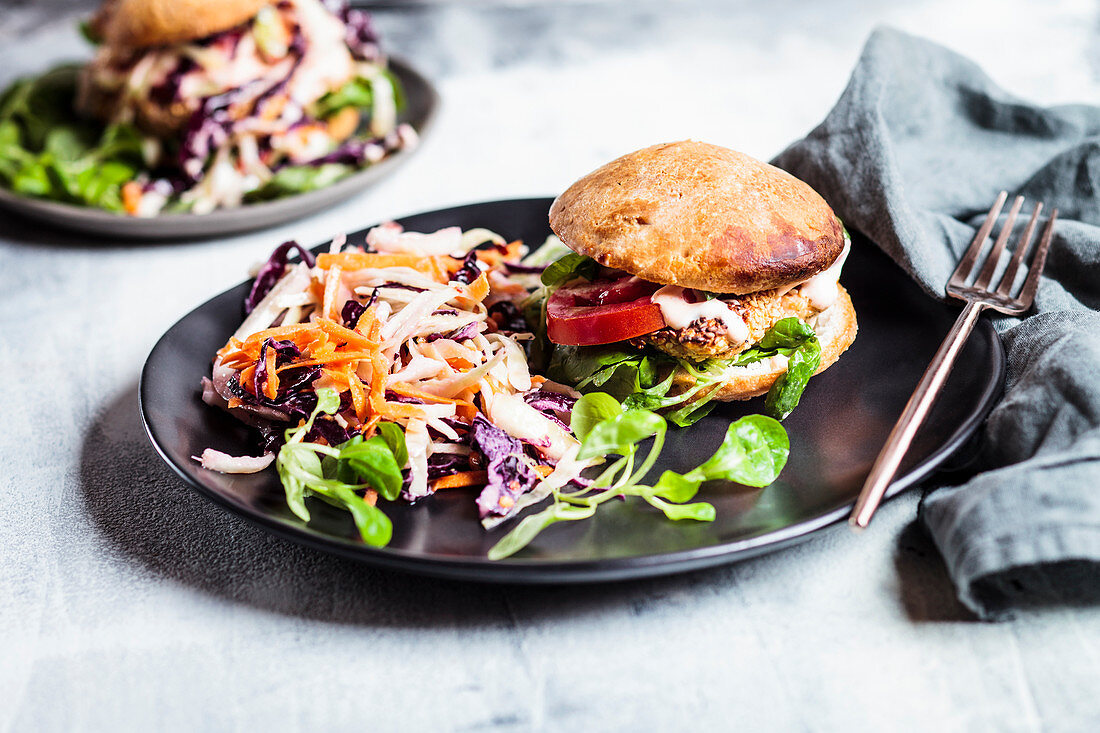 Gluten-free salmon burger with cole slaw