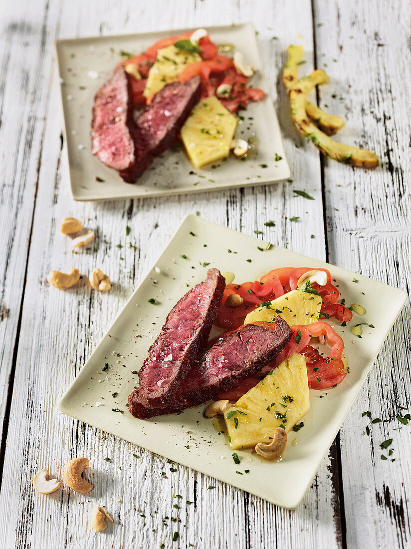 Flat Iron steak made in a Beefer with a pineapple and tomato carpaccio
