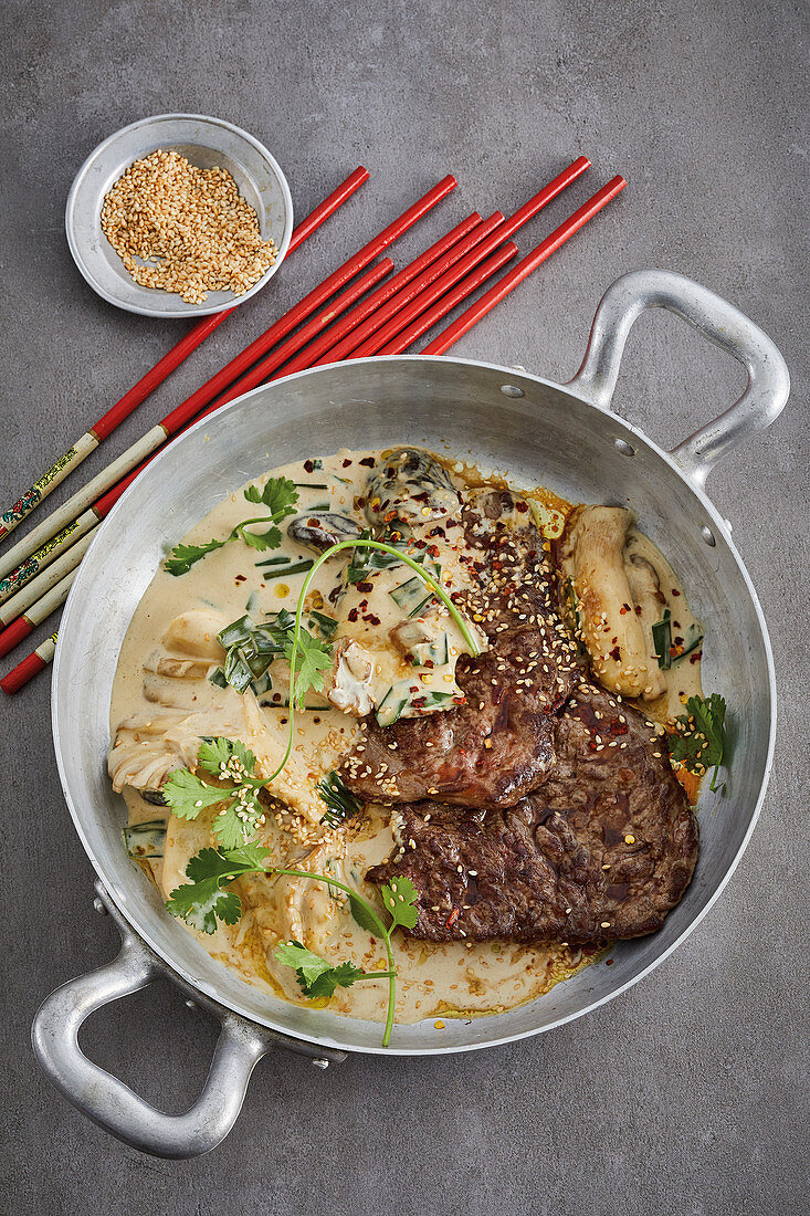 Beef fillet steak with a brandy and mushroom sauce and roasted sesame seeds