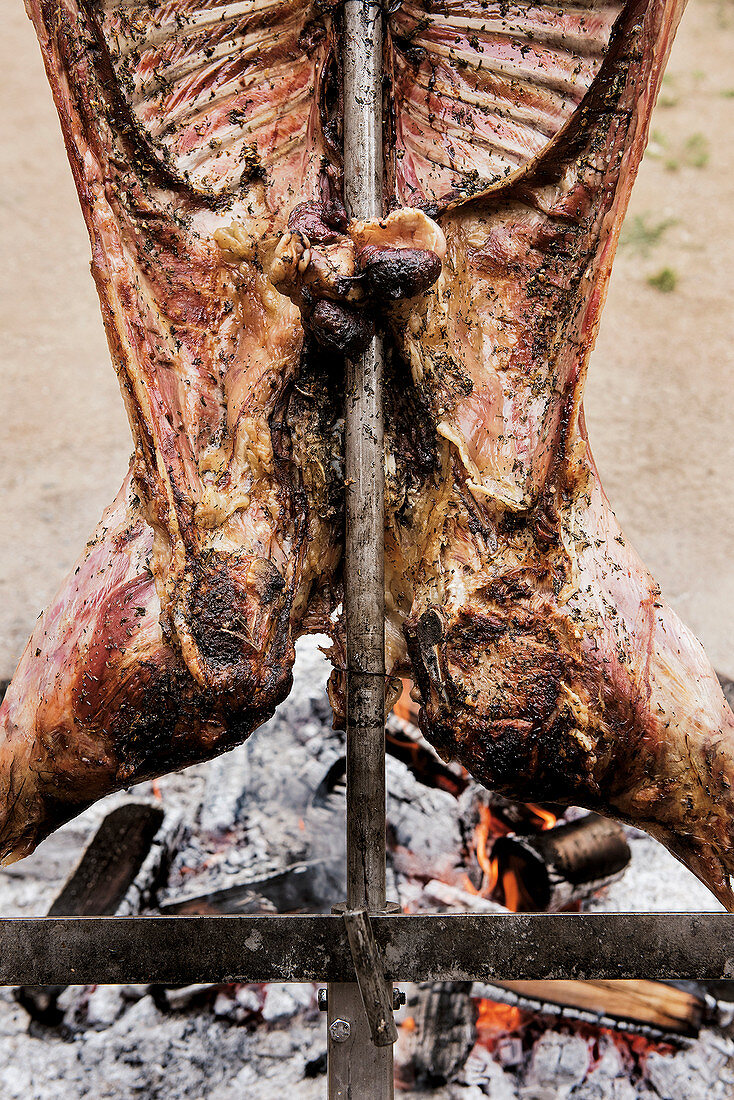 Whole lamb grilled on a cross