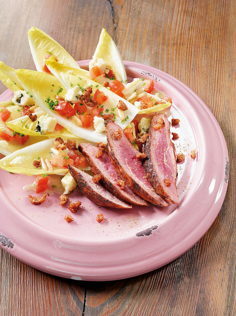 Barbary duck breast made in a Beefer with a chicory salad