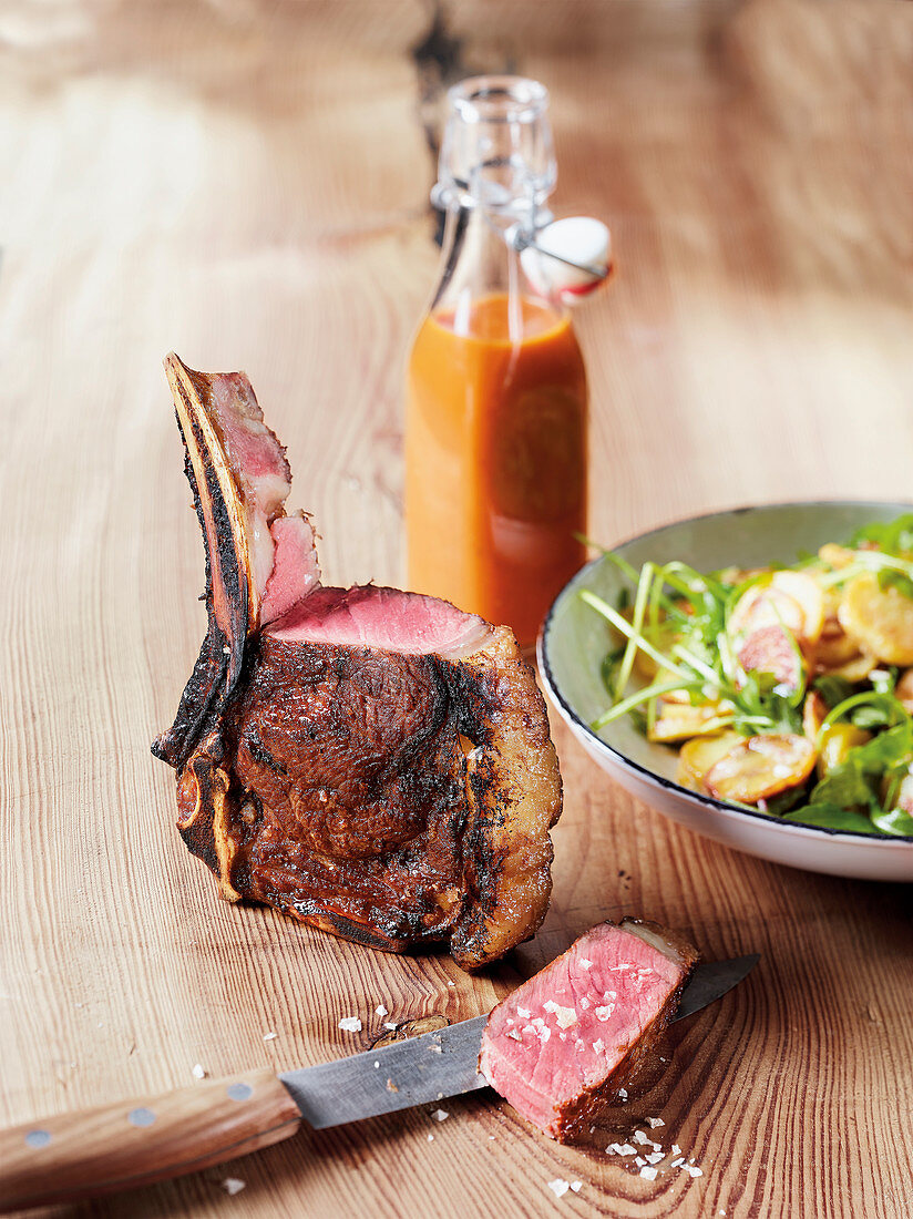 Dry-aged Hereford prime steak made in a Beefer with a fried potato salad