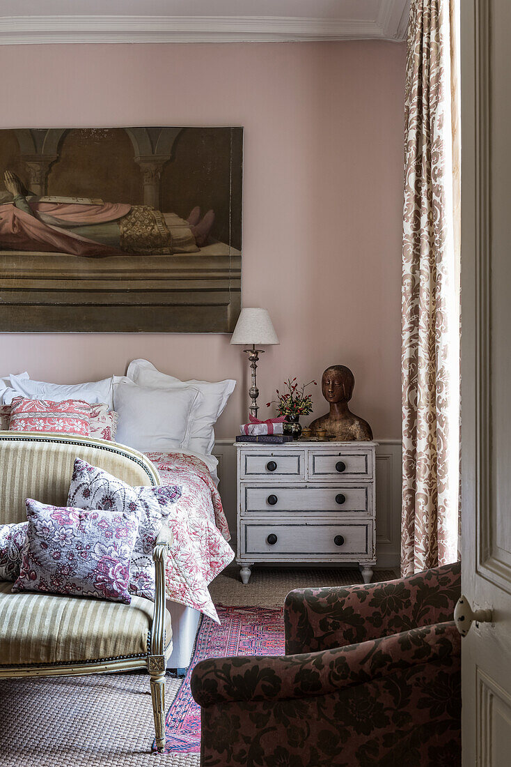 Vintage French ‘indienne’ quilt and curtain fabric from The Silk Gallery with walls painted Setting Plaster by Farrow &amp; Ball