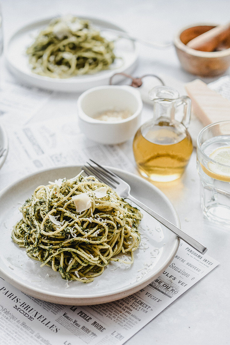 Spaghetti with pesto and parmesan cheese