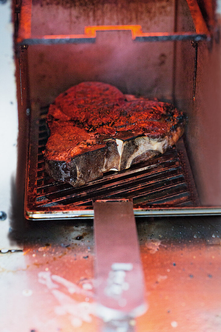 Steak being grilled in a Beefer