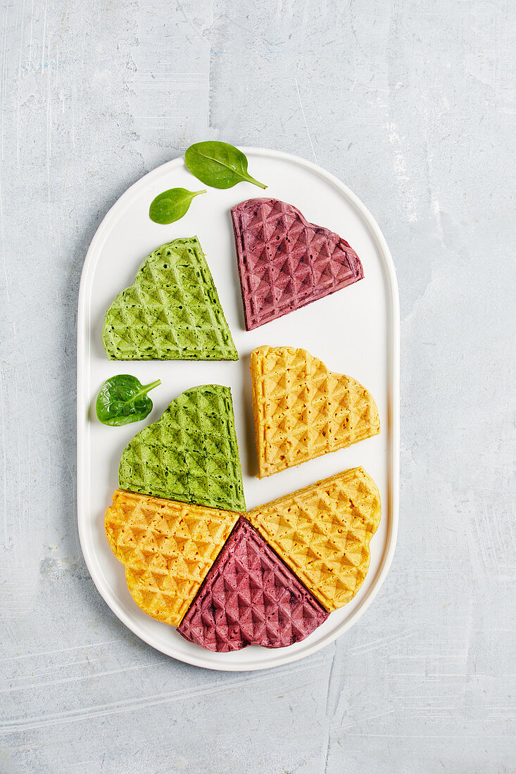 Colourful vegetable waffles made with spinach, beetroot and carrot