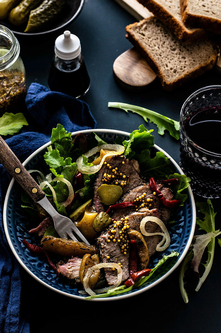 Roasted beef with French mustard greenleaves bread pickles