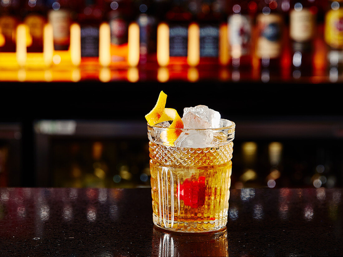 An Old Fashioned cocktail in a bar