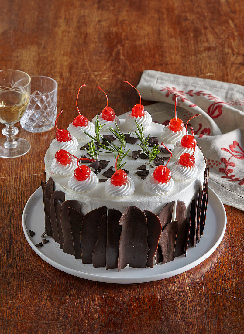 Cake with chocolate and cherries