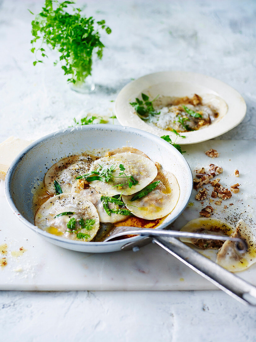 Mushroom and goat's cheese ravioli with tarragon brown butter