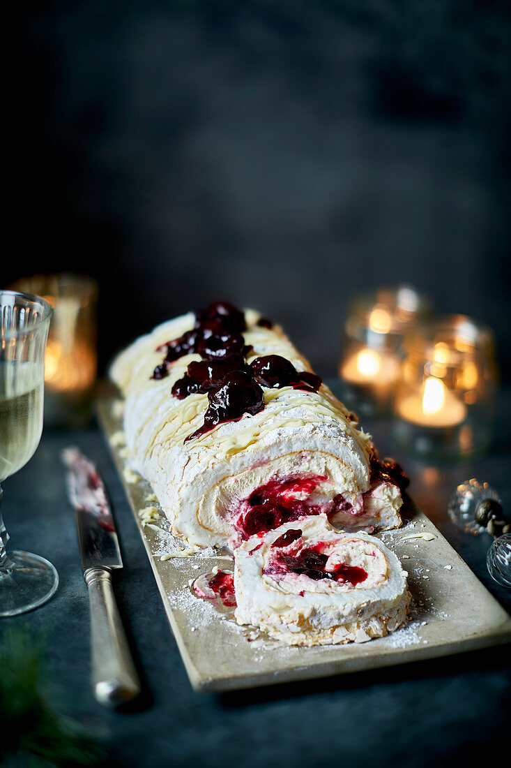 White forest meringue roulade