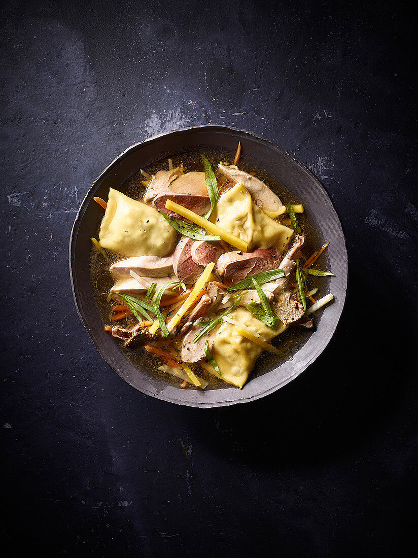 Game pot au feu with Maultaschen (Swabian ravioli)