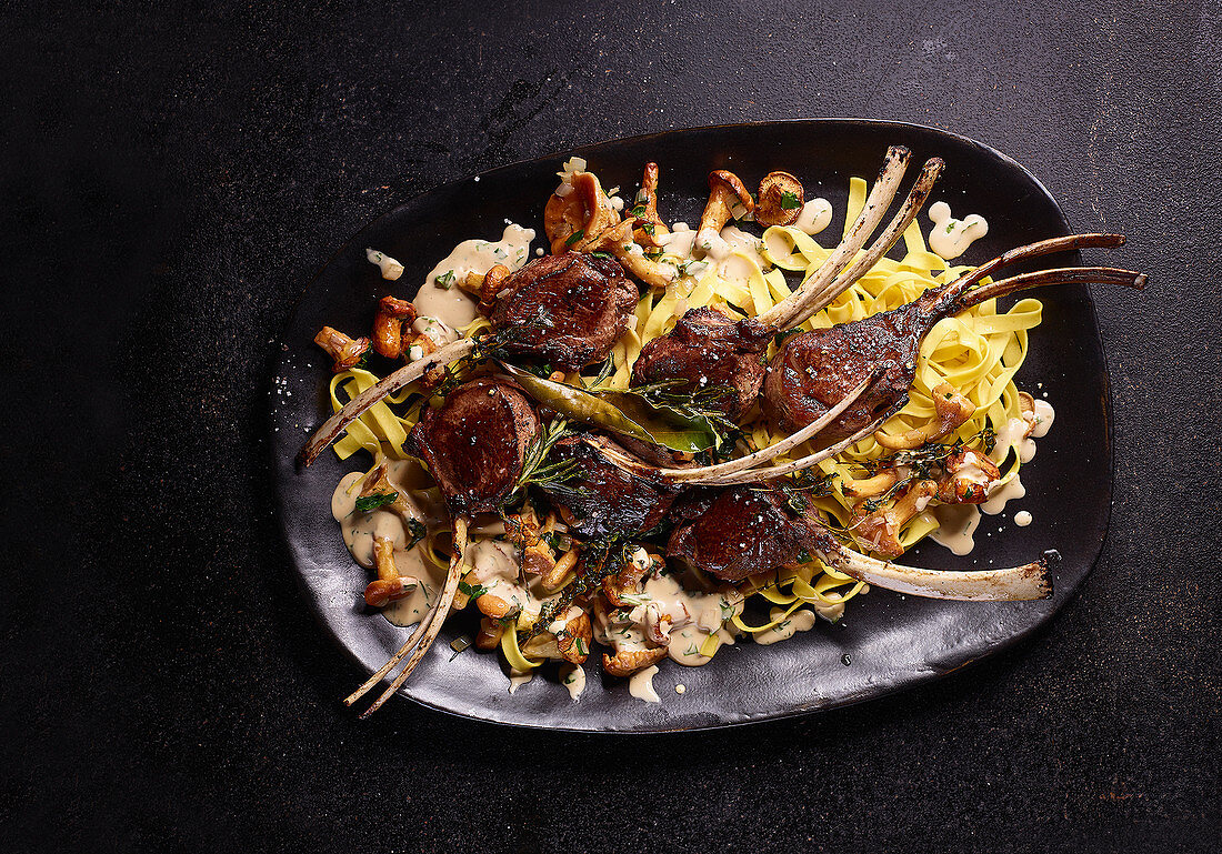 Herb venison chops with tagliatelle and creamy chanterelles
