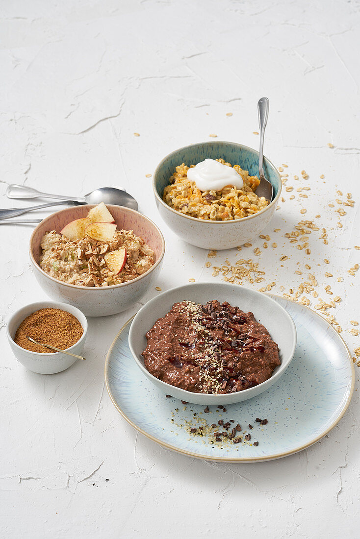 Three types of porridge: chocolate, apple, and carrot