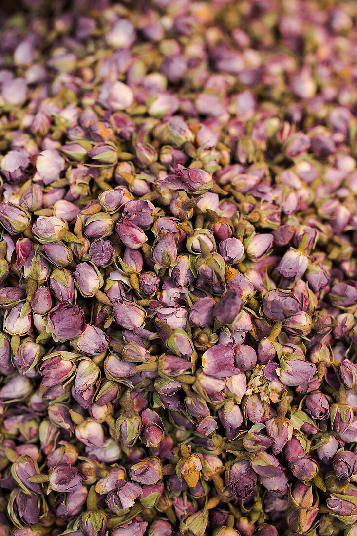 Dried rose petals on a market stand