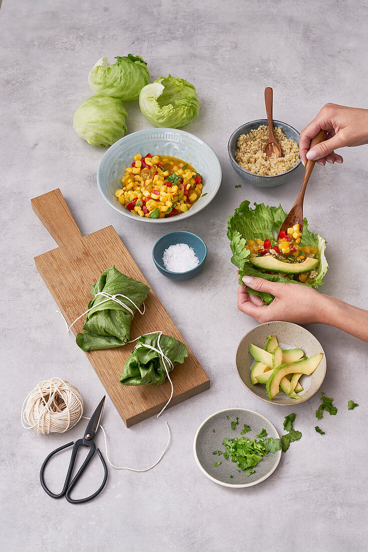 Lettuce wraps with mango salsa being made
