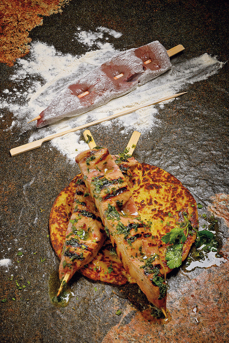 Veal liver kebab with a potato and apple fritter and herb butter