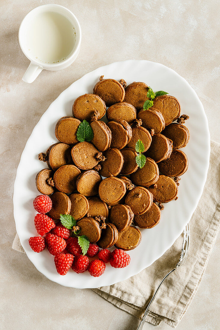 Chocolate mini pancakes with raspberry