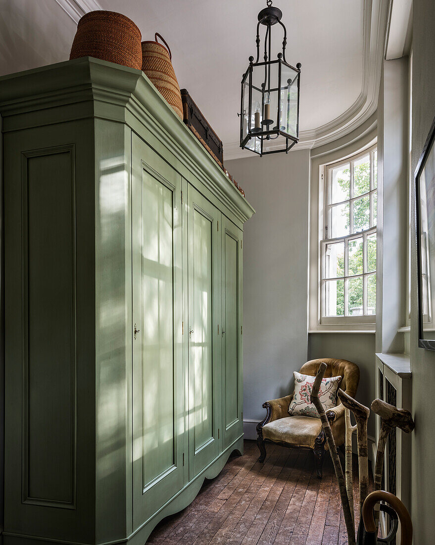 Large green wardrobe in Victorian dressing room