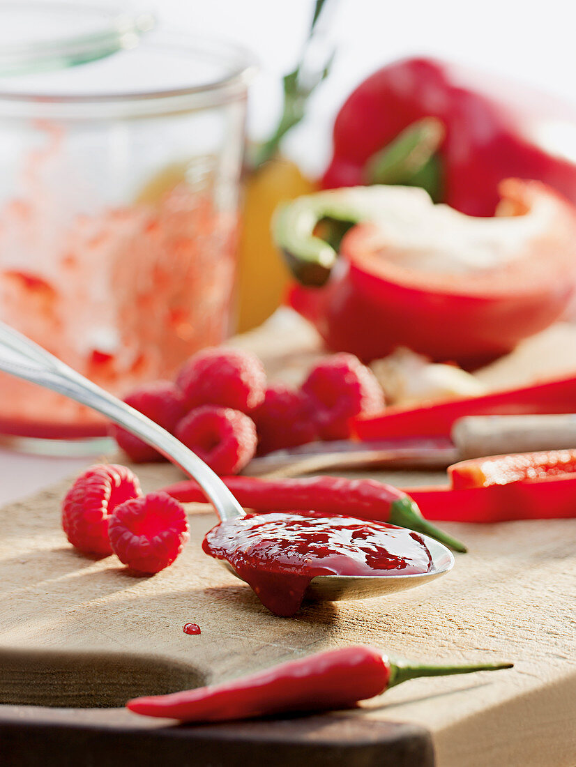 Raspberry pot with peppers and chilli