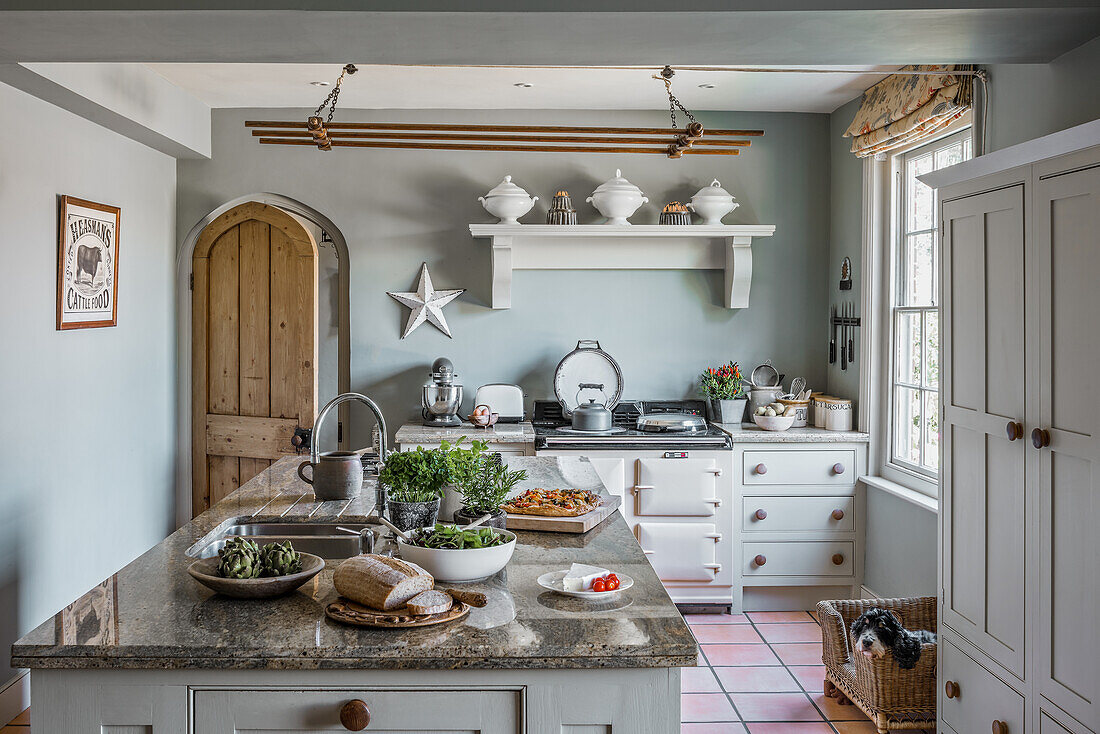 Fresh food on kitchen island in restored 16th century farmhouse