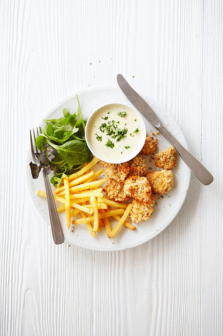 Mini schnitzels with garlic sauce