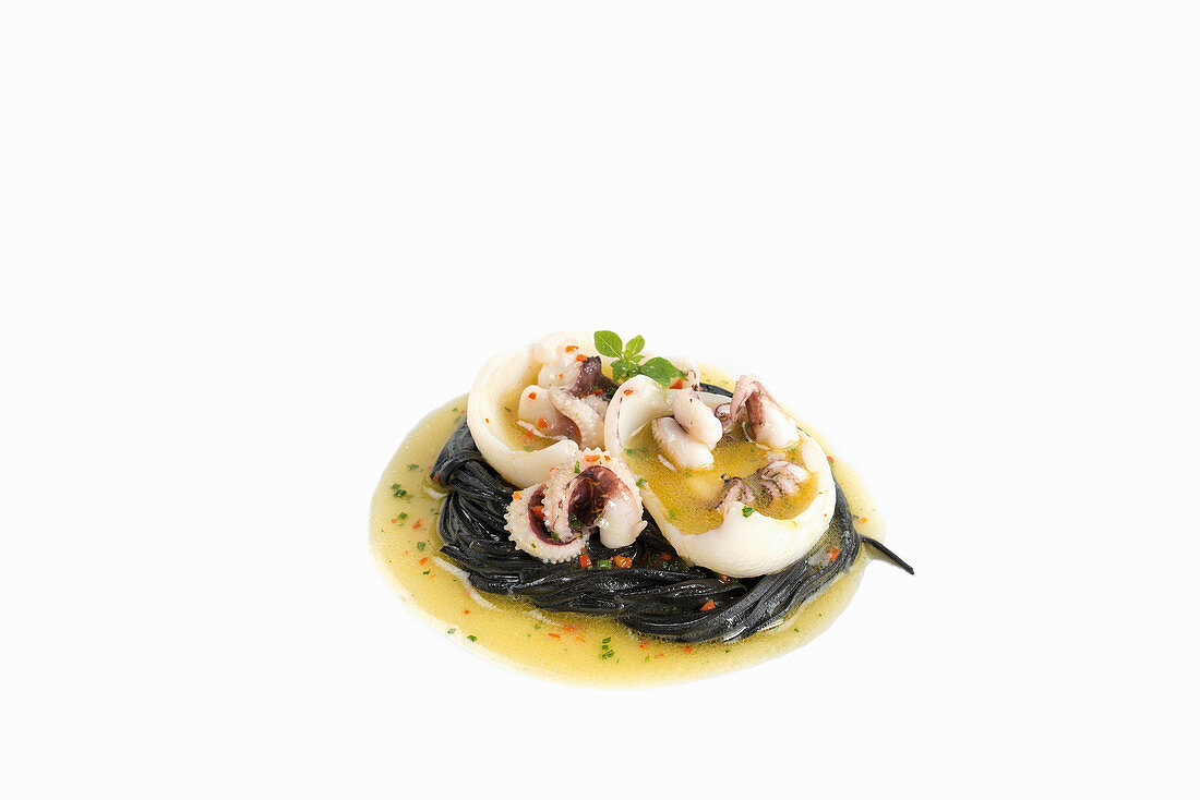 Marinated calamari with black noodles and lime-chili marinade