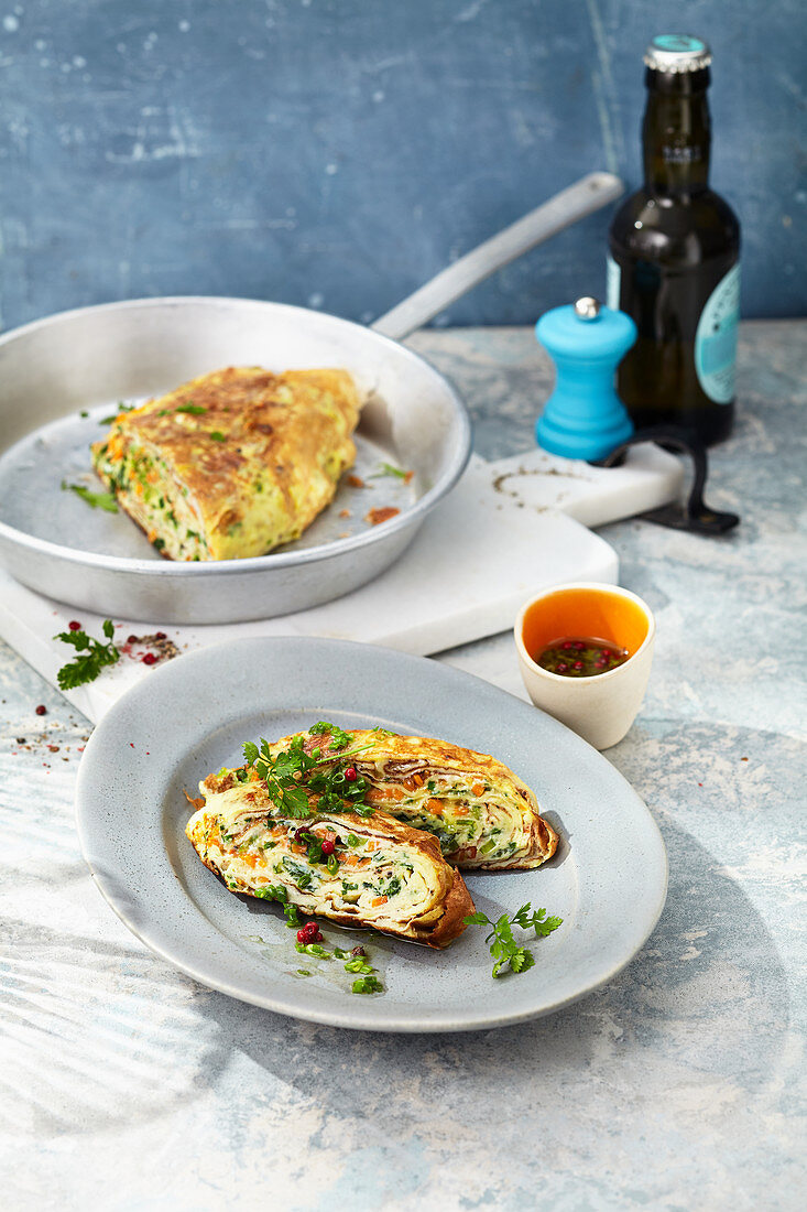 Rolled omelette with a chive dressing