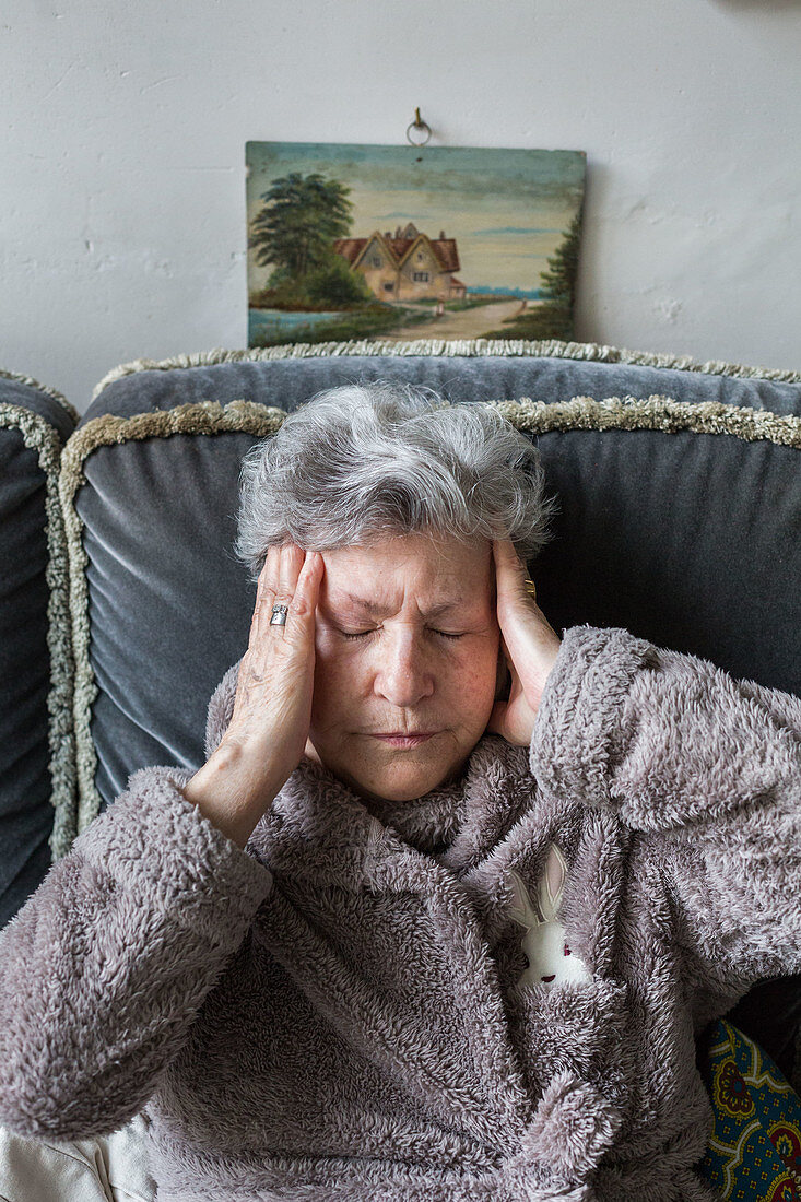 Woman suffering from headache