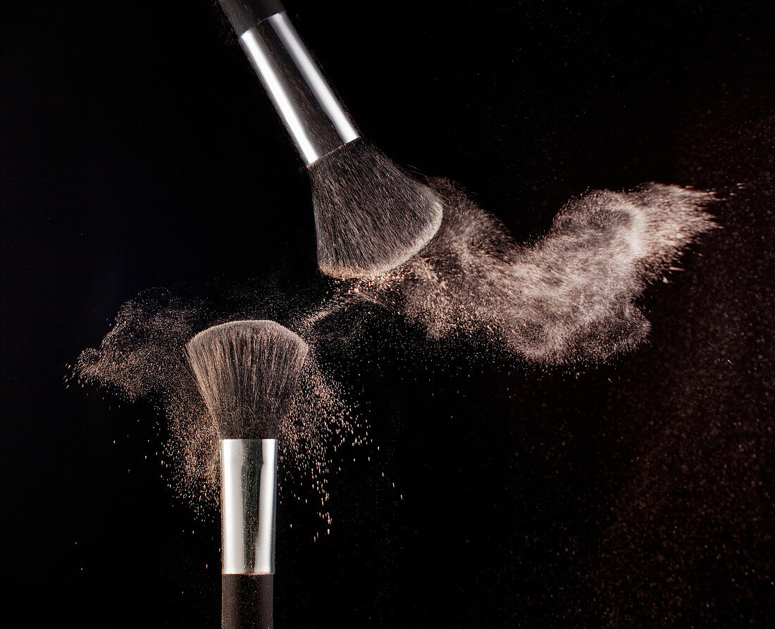Powder blowing from makeup brushes