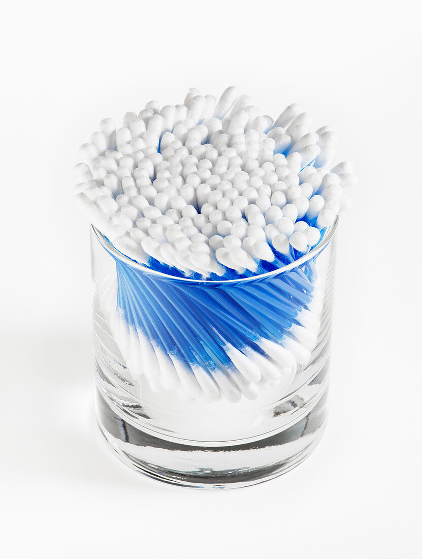Close up of cotton swabs in jar