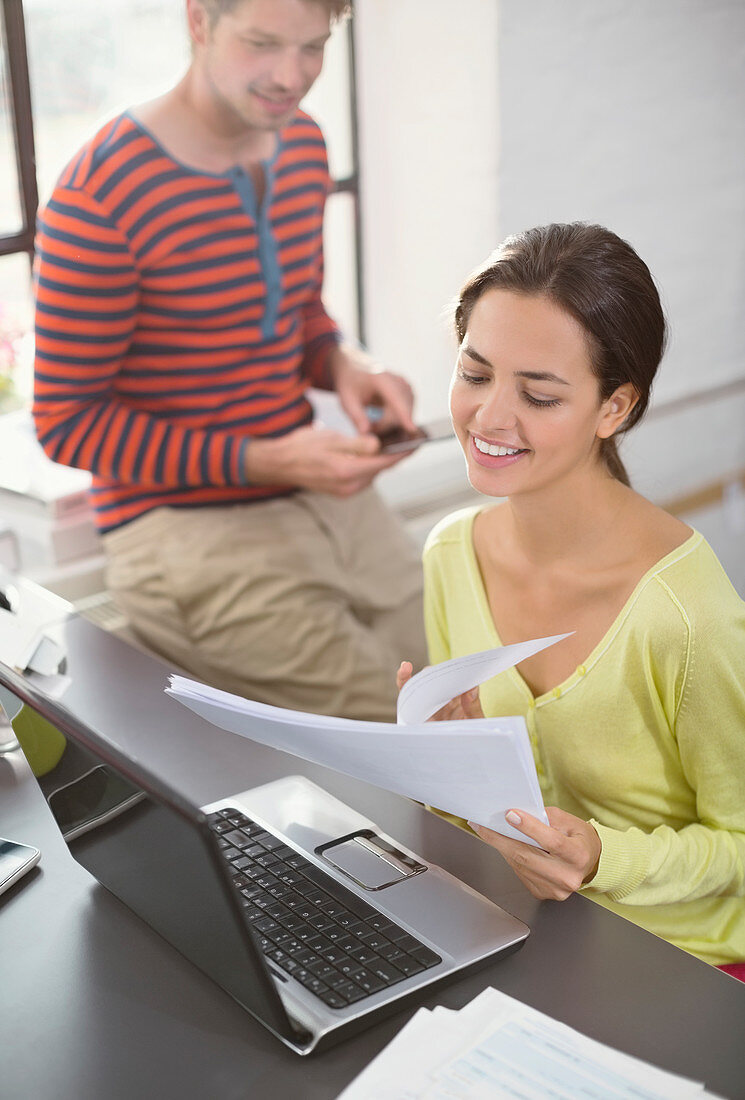 Couple working together at desk