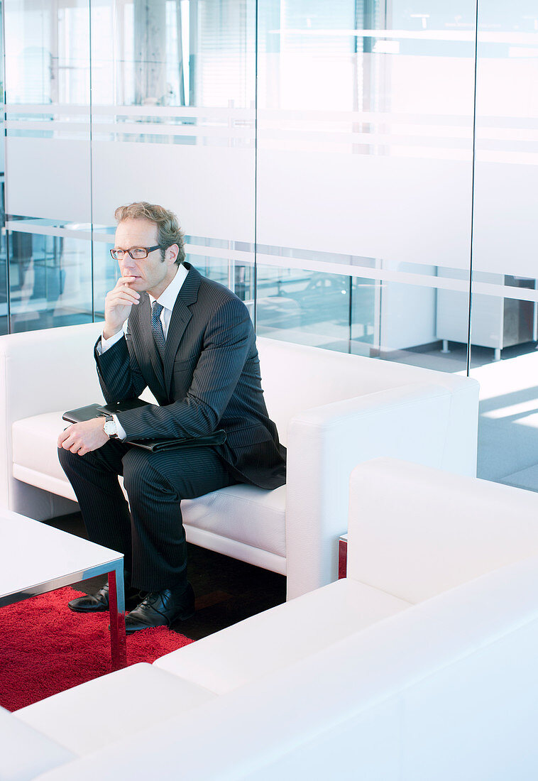 Business man sitting on sofa