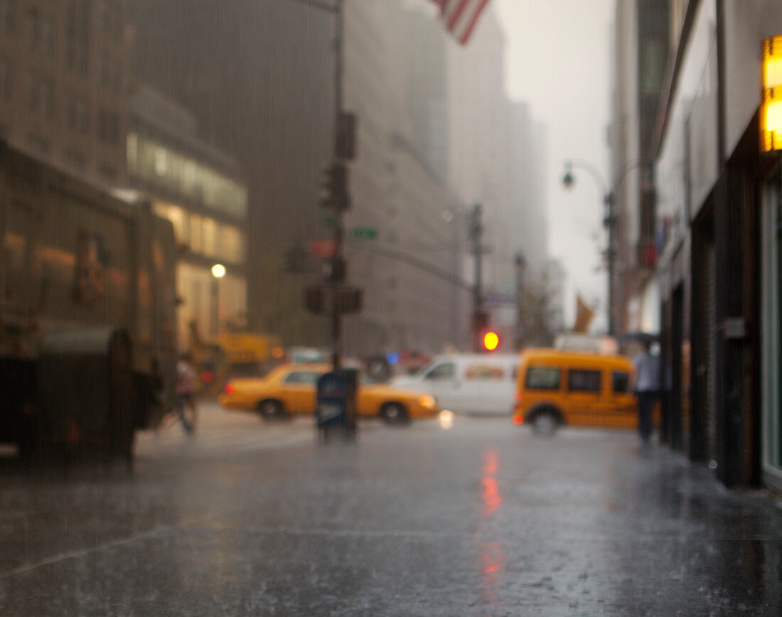 Blurred view of rainy city street