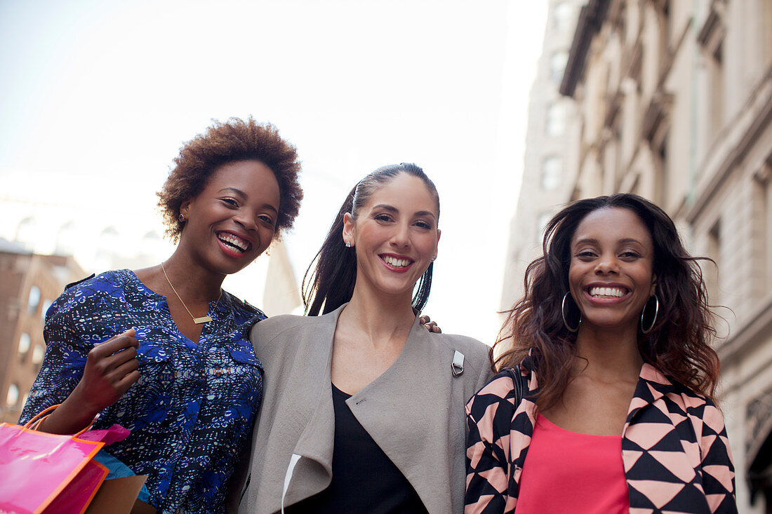 Women walking together on city street