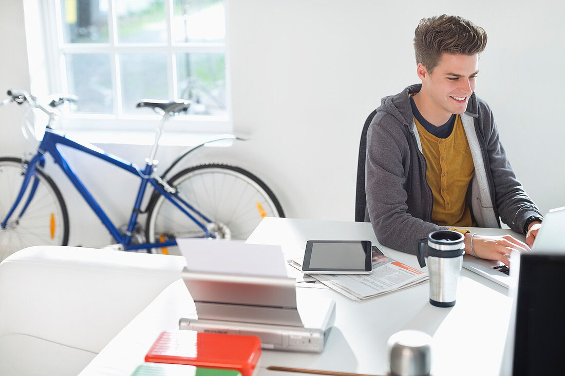 Businessman working at desk in office