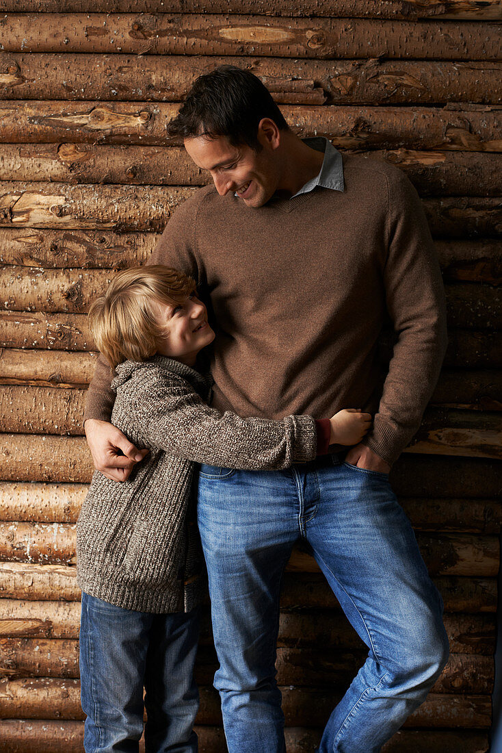 Father and son hugging outdoors