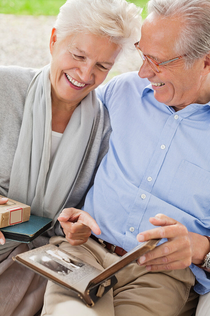 Couple looking through photo album