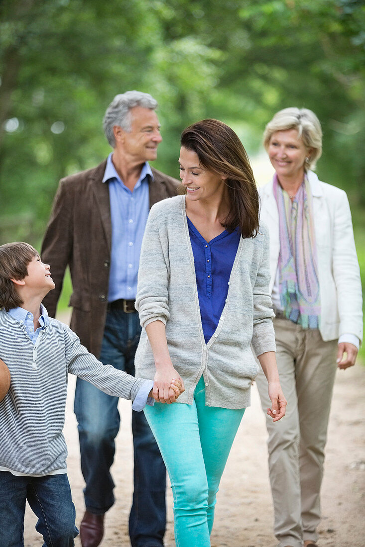 Family walking on rural road