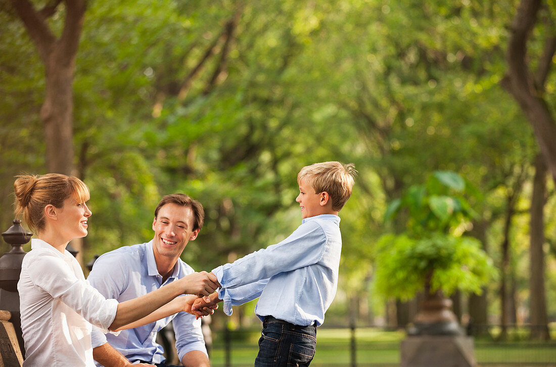 Family playing together in park