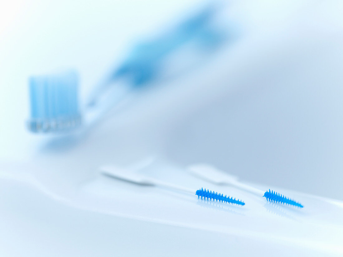 Close up of toothpicks and toothbrush