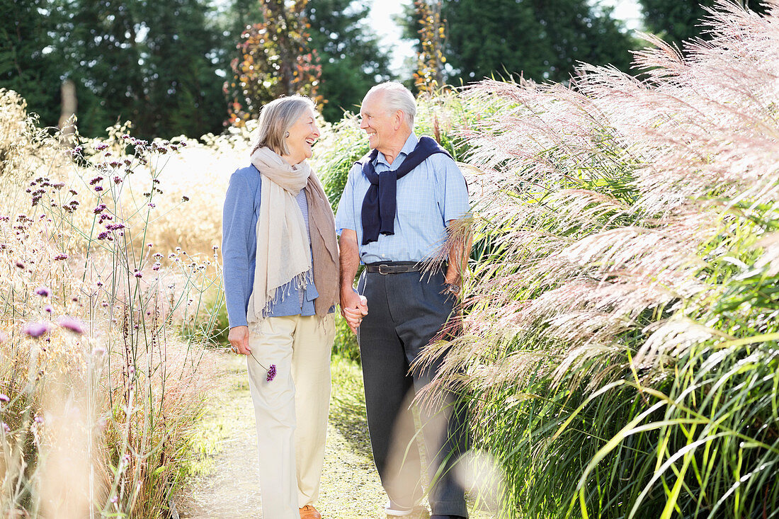 Older couple walking outdoors