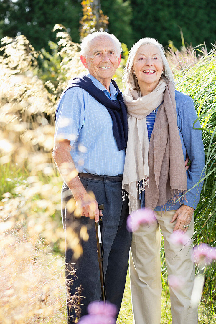 Older couple standing together outdoors