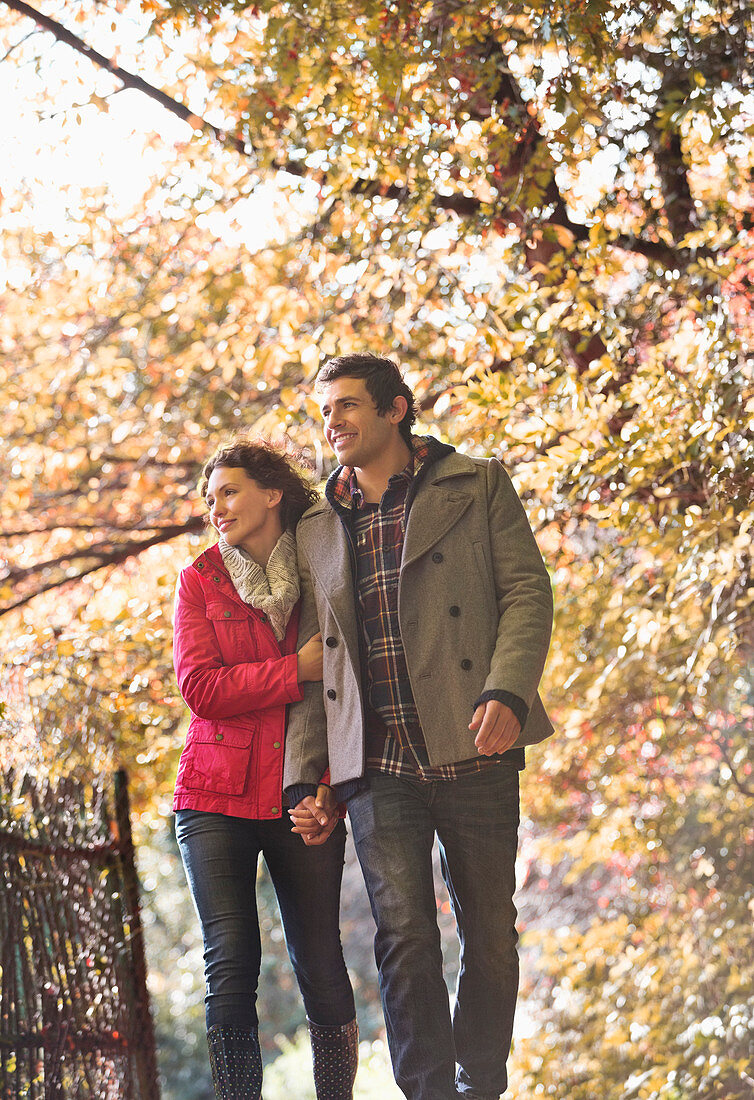 Couple walking together in park