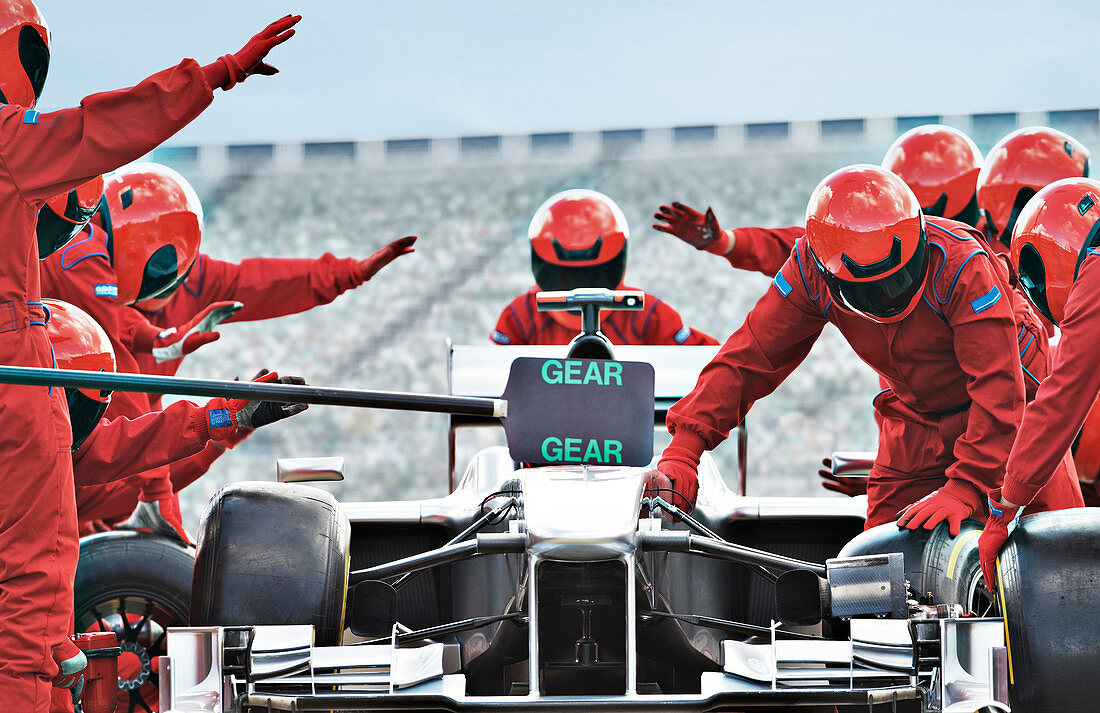 Racing team working at pit stop