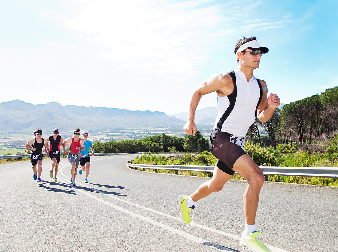 Runners in race on rural road