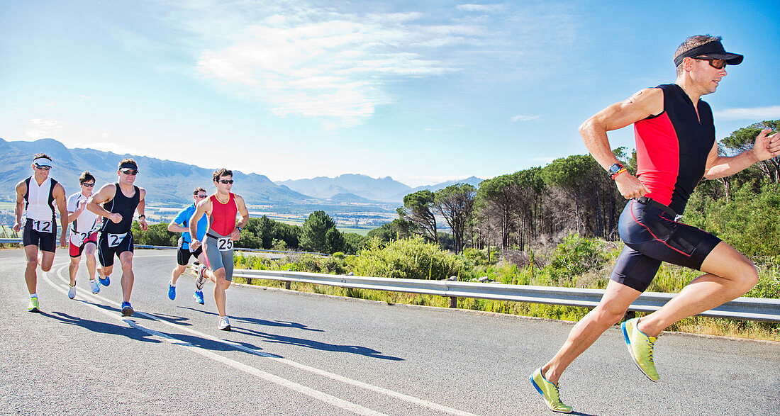 Runners in race on rural road